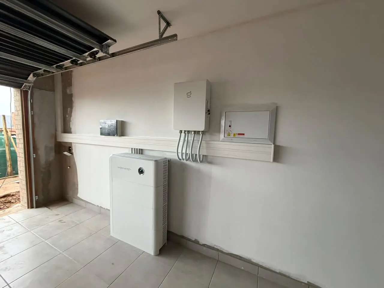 Installed battery bank and inverter equipment for grid and generator hybrid integration