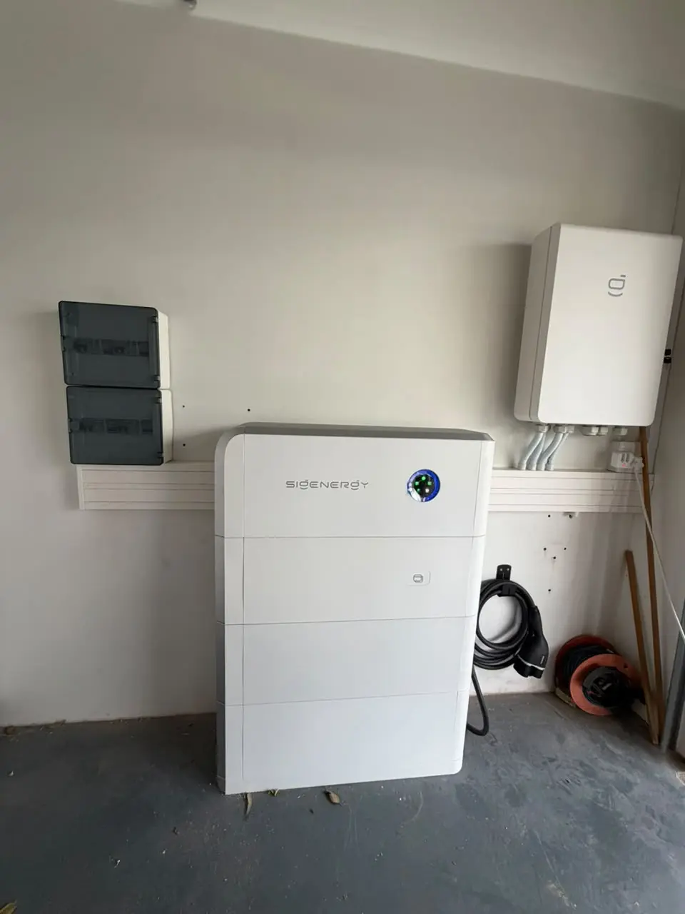 Installed battery and inverter system with remote energy monitoring capability