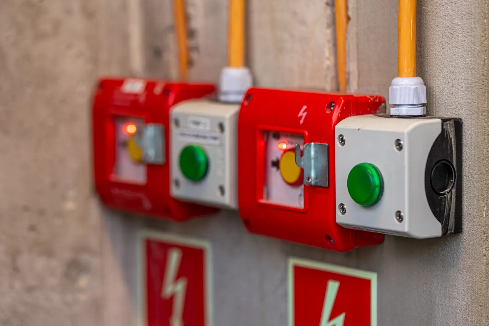 Emergency stop and isolation controls for containerised energy-system safety