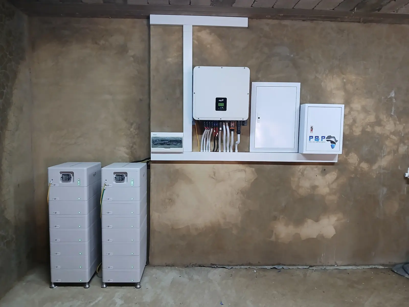 Completed FoxESS inverter and modular battery installation with electrical protection