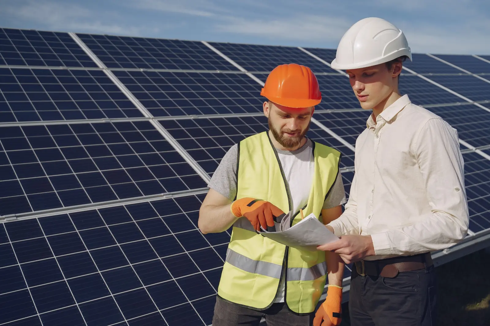 Technical representatives planning a utility-scale photovoltaic solar project