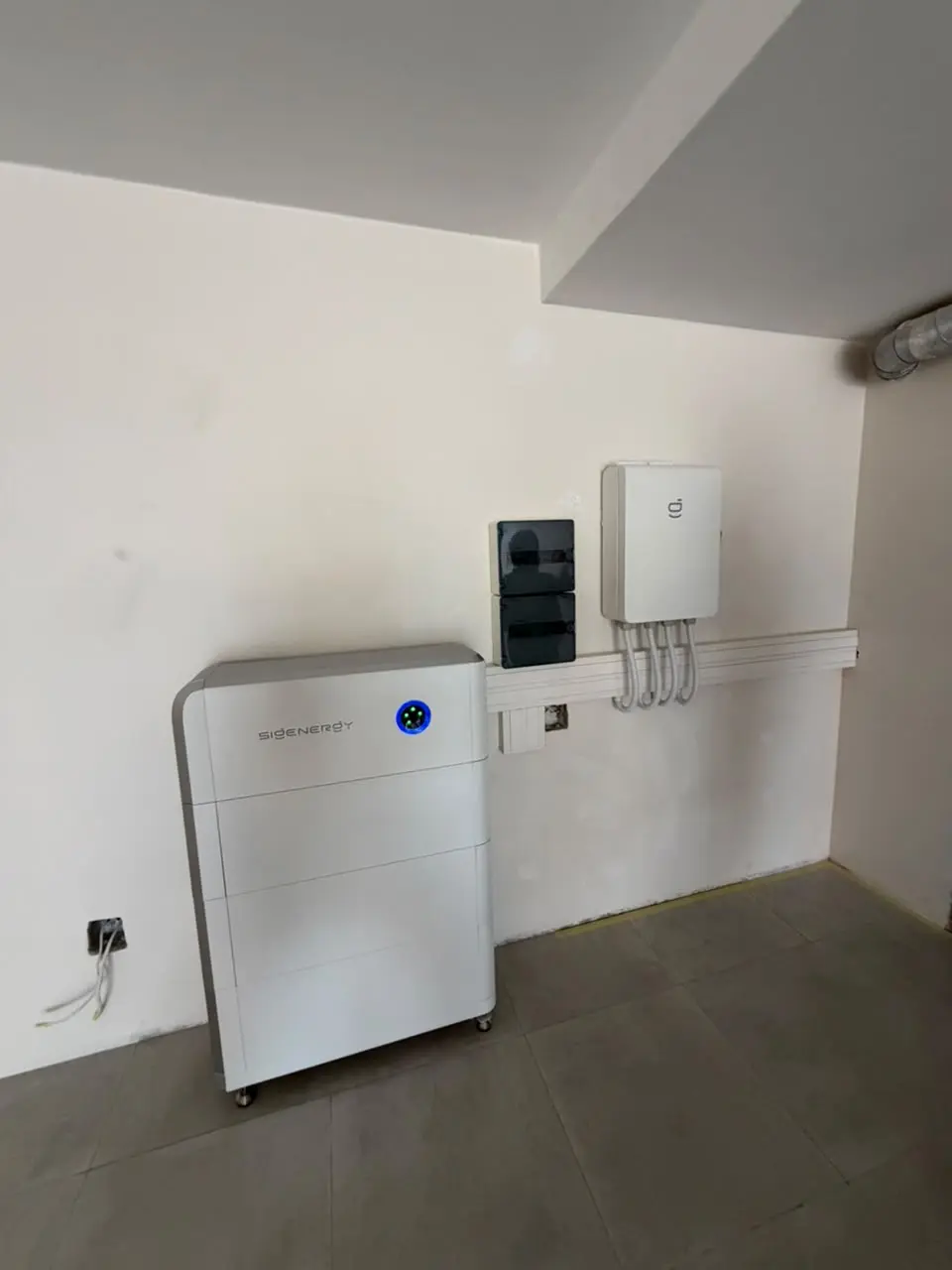 Solar battery and inverter system installed in a dedicated indoor area